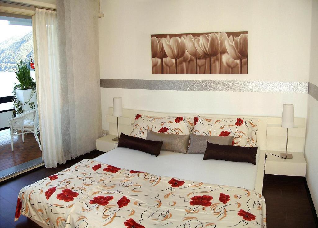 Hotel Garni Battello Melide Quarto foto