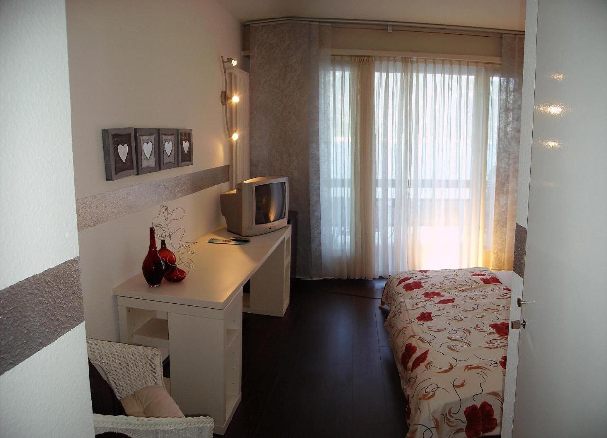 Hotel Garni Battello Melide Quarto foto